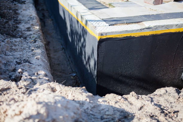 Professional Emergency Waterproofing technician working in Greencastle, PA